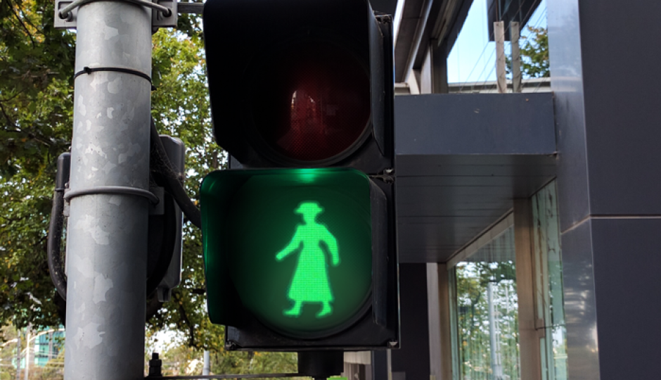female traffic crossing lights