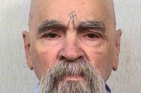 Charles Manson with swastika