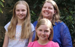 Perth mother Maggie Johns, with daughters Sarah, 11, and Becca, 8, says babysitting apps have made life easier.