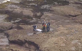boat capsize Sydney Anzac Day