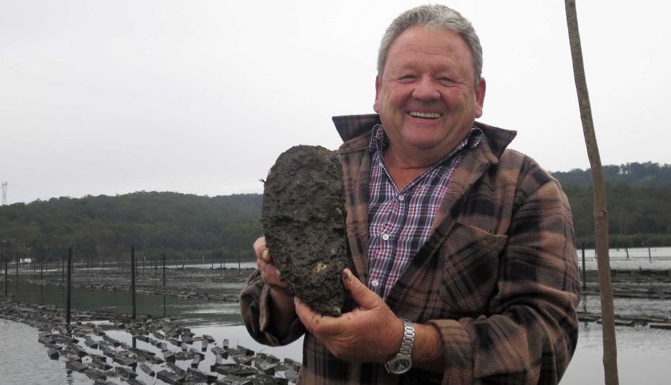 Bernie Connell with a giant Pacific oyster