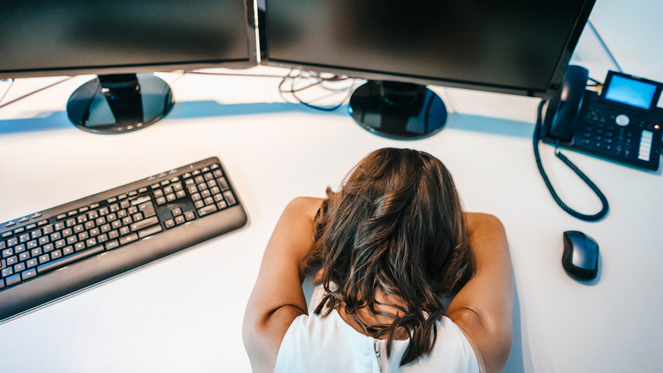 woman asleep desk