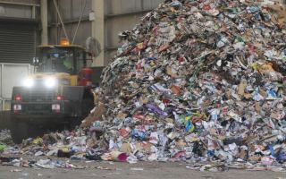 Recycling piles up in an Adelaide facility.