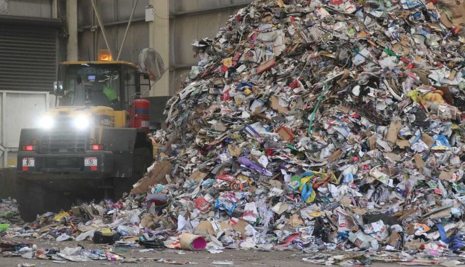 Recycling piles up in an Adelaide facility.