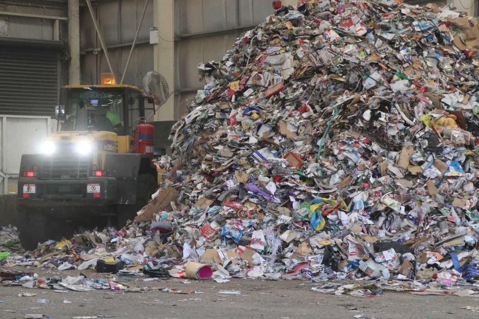 Recycling piles up in an Adelaide facility.