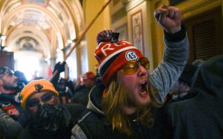 Supporters of US President Donald Trump protest inside the US Capitol on January 6, 2021, in Washington, DC. - Demonstrators breeched security and entered the Capitol as Congress debated the a 2020 presidential election Electoral Vote Certification. (Photo by ROBERTO SCHMIDT / AFP) (Photo by ROBERTO SCHMIDT/AFP via Getty Images)