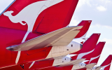 Qantas planes lined up on the tarmac flight credits