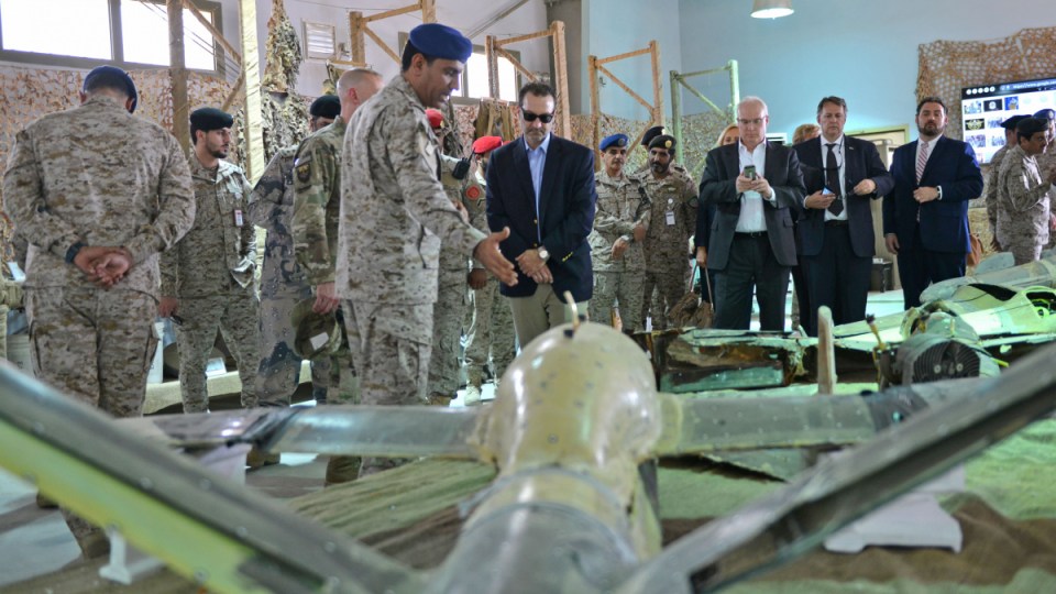 Colonel Turki al-Malki with supposedly Iranian weapons used by rebels in Yemen.