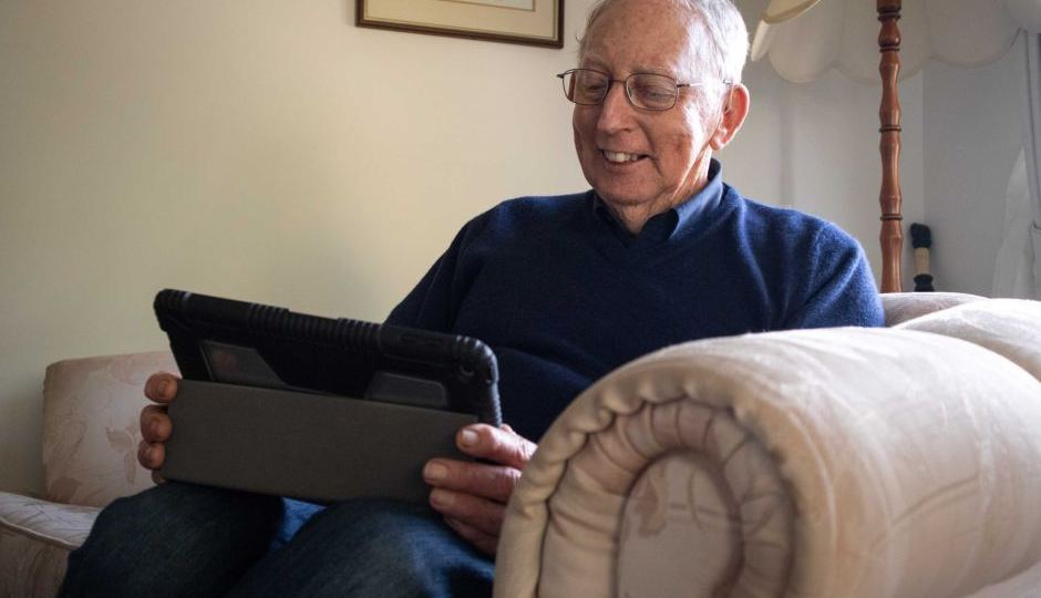 John Broadbent on his iPad.