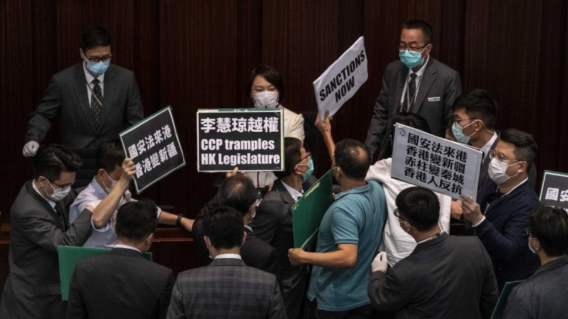 Pro-democracy Hong Kong lawmakers protested against the Chinese government’s planned national security laws at a committee meeting in Hong Kong, on Friday, May 22, 2020. Beijing’s move to take a direct hand in the territory’s affairs will pit the pro-democracy movement against an uncompromising Communist Party. (Lam Yik Fei/The New York Times)