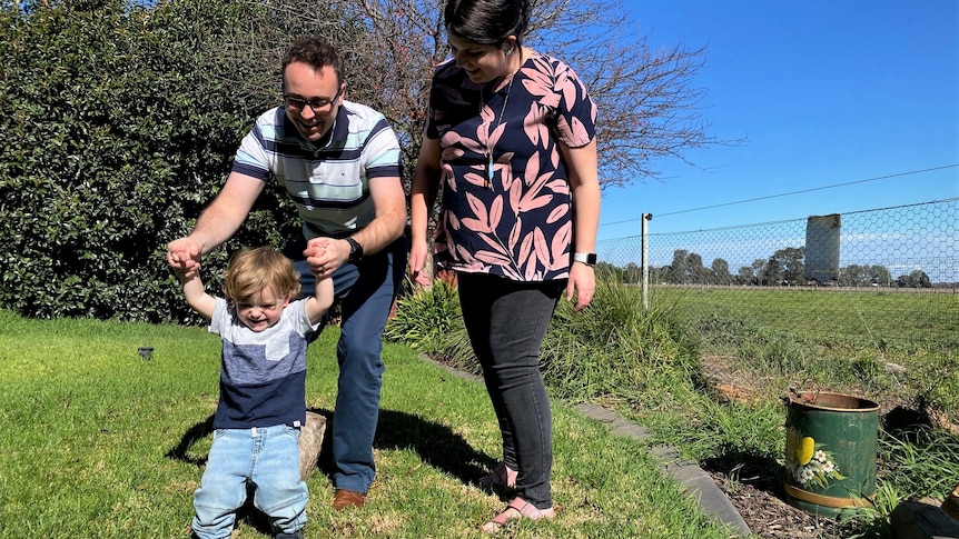 Jessica and Geoff Zach and their young child Teddy.