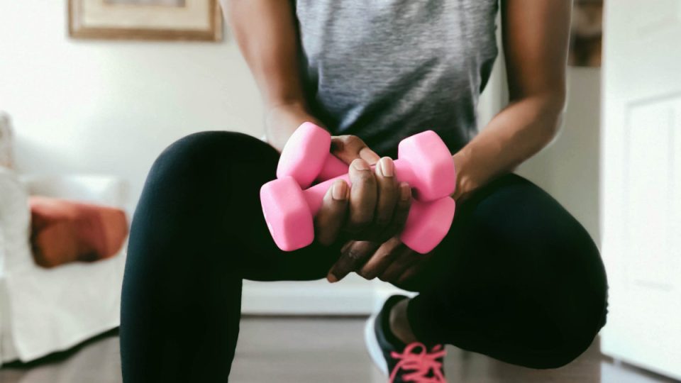 Woman Works Out at Home