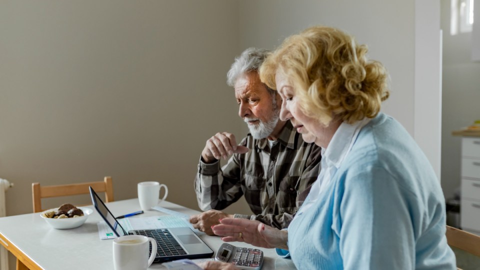 scams old couple bills