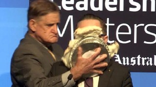 Alan Joyce got a pie to the face