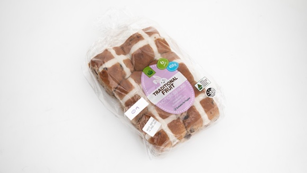 Pictured is a pack of Woolworths Traditional Fruit Hot Cross Buns