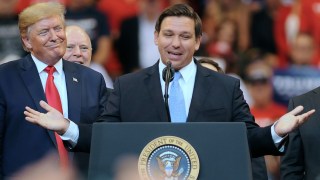 Pictured is Ron DeSantis and Donald Trump