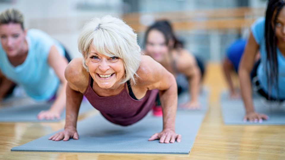 senior woman in exercise class
