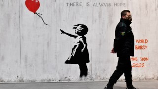 pictured is a Banksy pice in Italy